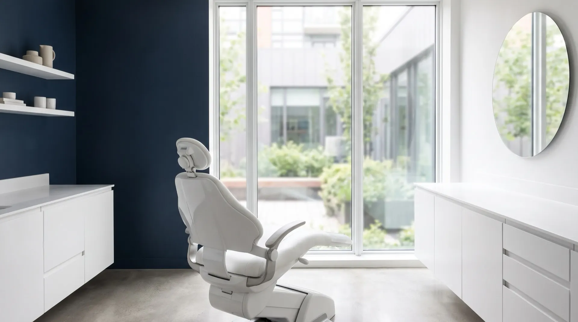 Modern dental studio with navy accent wall and daylight